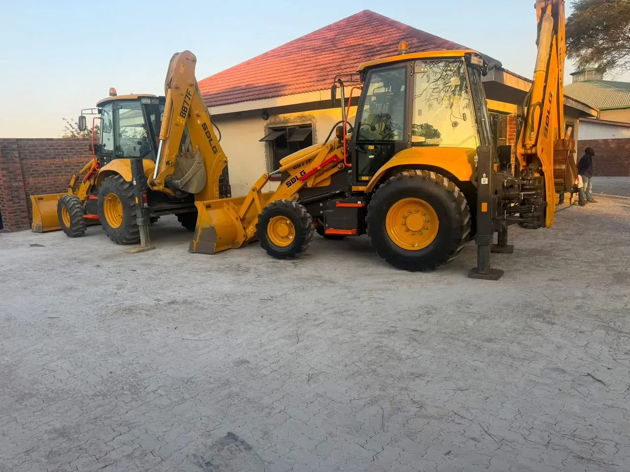 Two SDLG backhoe loaders ready for hire